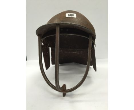 An English cavalry troopers helmet dating from the Civil War period 1642/49, hinged peak with characteristic three bar face g