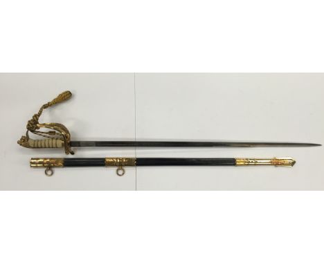 A late 20th century Naval Officer's sword with leather belt and gilt buckle, retailed by Gieves & Hawkes, London, the sword b
