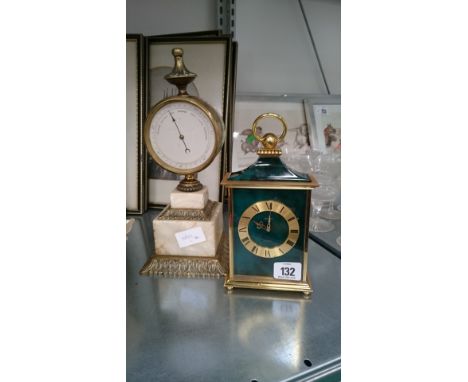An Empire style brass cased barometer (af) together with an Angelus electronic mantle clock.