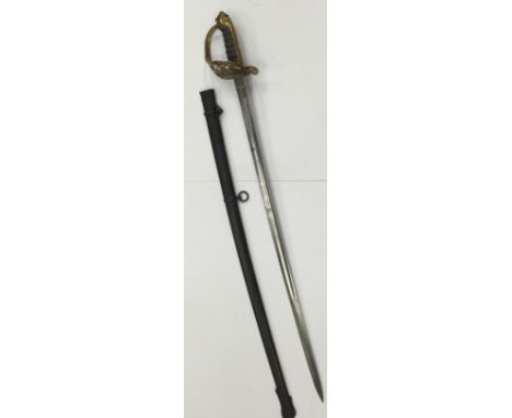 An 1845/Patt Victorian Infantry Officer's sword, the blade etched with Crown and Swags, the hilt gilded brass, retaining a lo