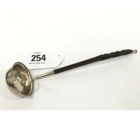 A Scottish silver Toddy ladle with twist stem.
(R15)