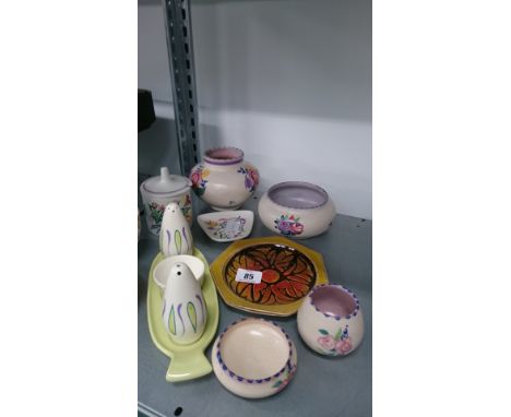 A collection of various Poole Pottery items.