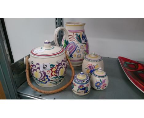 A Poole Pottery jug decorated in the TV pattern by Anne Godfrey (later mark) together with five other Poole Pottery items.
