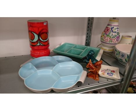 A Poole Pottery Delphis vase, shape 84 together with two hors d'oeuvre trays and three other Poole Pottery items.