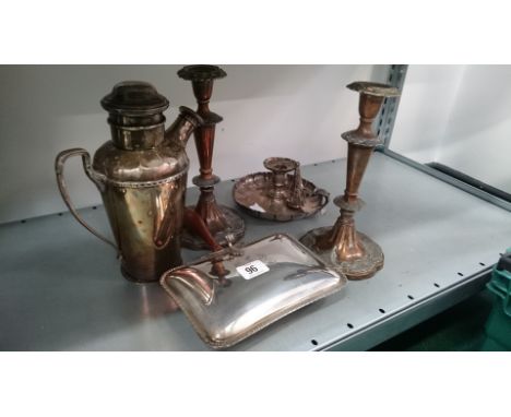 An Art Deco silver plated cocktail shaker together with a chaffing dish, chamber candlestick and a pair of silver on copper c