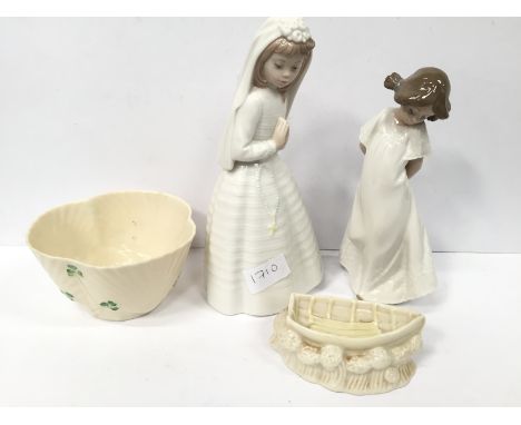 A Belleek china Rowing Boat ashtray together with a shell shaped sugar bowl and two Nao china figures.