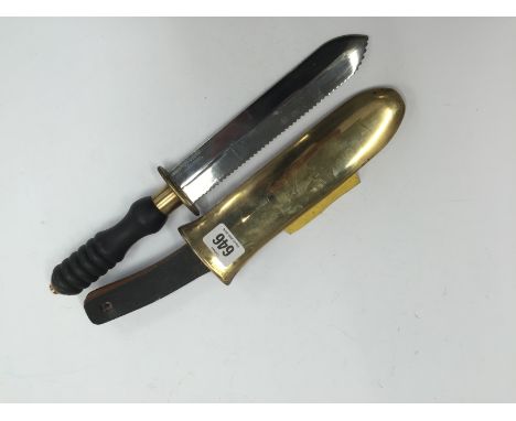 A Siebe Gorman diver's knife, marked to blade, non magnetic in H. S. brass scabbard.