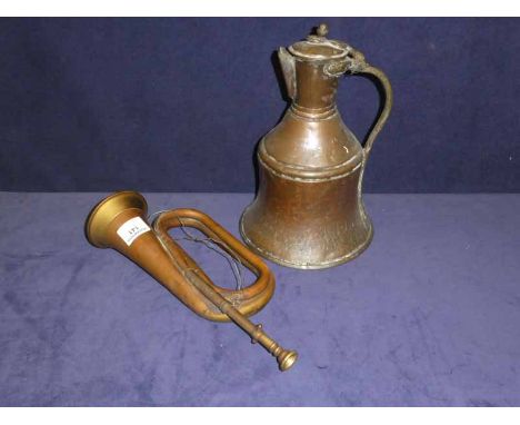 A copper and brass bugle by Boosey and Hawkes and a Turkish copper lidded jug