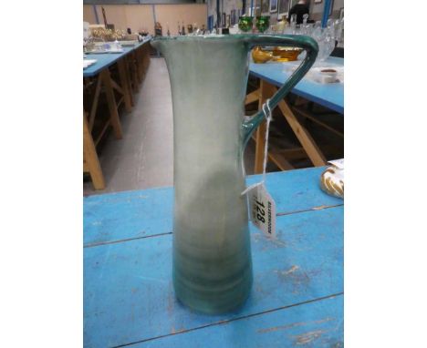 A Moorcroft Toucan &amp; Jade tall jug in banded green, impressed marks to the base 24 cm H