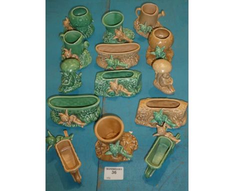 Fourteen Sylvac imp planters planters, posy holders, etc