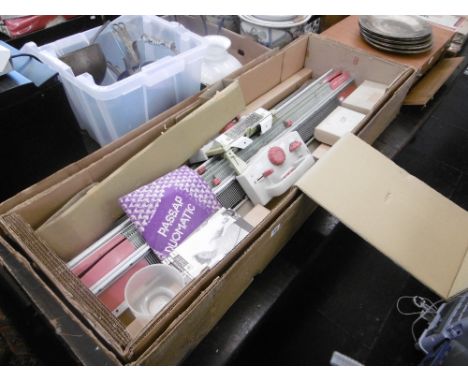 A Passap Duomatic knitting machine with instruction manual
