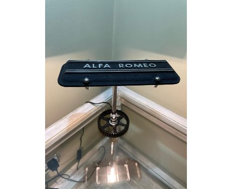 Restored cam-cover from an Alfa Sud flat-four engine repurposed into an attractive desk lamp.An attractive desk lamp created 