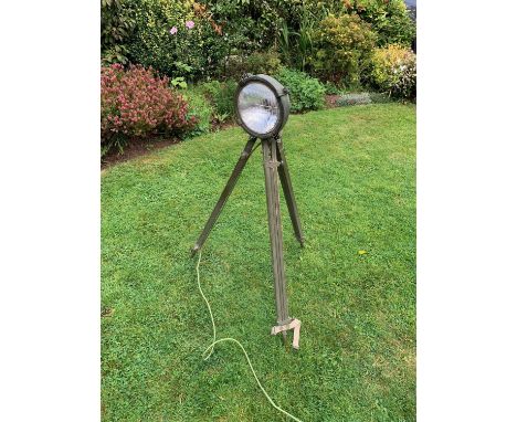 Re-cycled militaria. 60s chieftain tank headlight/spotlight atop a WW11 tripod. Correctly wired.Ideal man-cave indoor lightin