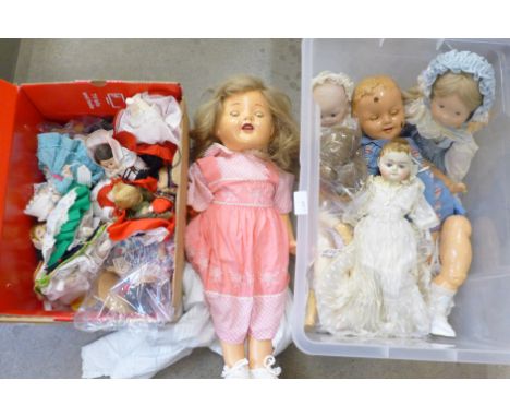 Six dolls including a Shirley Temple doll, a/f, and others, all vintage, together with a box of worldwide costume dolls datin