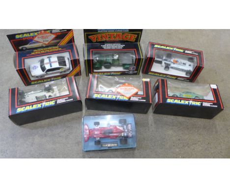 Seven vintage boxed Scalextric cars, 4½ ltr Bentley, C315 Police Rover, C303 Austin Metro, C380 Bison Computers Datsun 2602, 