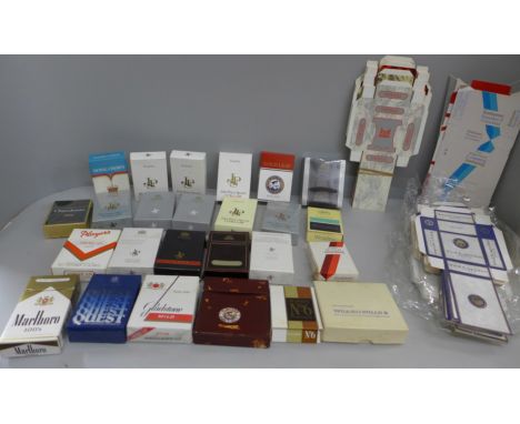 A collection of approximately 26 original and dummy cigarette packets from Imperial Tobacco, 1970s/80s used in tobacco market