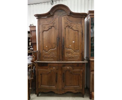 Large French Oak Armoire Cupboard, the upper section with shaped moulded cornice over two cupboard doors opening to an empty 