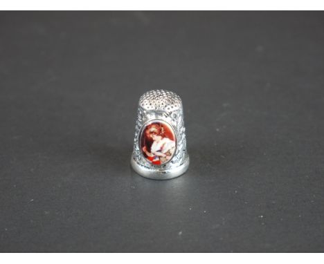 Silver thimble set with an oval ceramic panel 