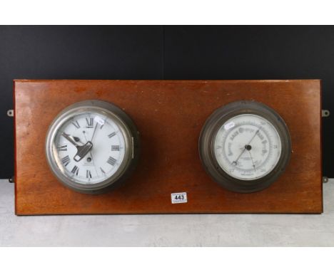 Smith's Metal Cased Bulkhead Chronometer with key, 22cm diameter together with a John Barker &amp; Co Ltd Bulkhead Barometer 