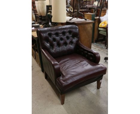 Victorian style Burgundy Leather Armchair with button-back and arms, raised on square tapering legs, 79cm wide x 100cm deep x