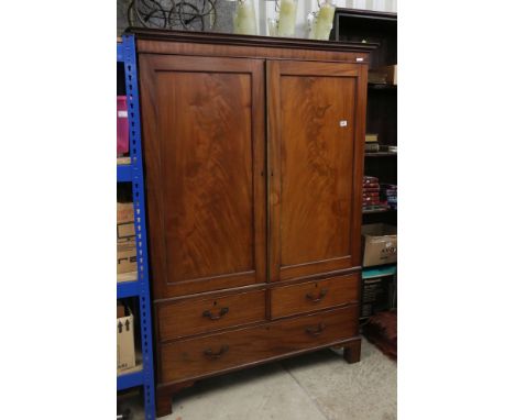 George III Mahogany Wardrobe, modified to one hanging space with faux drawers below, raised on bracket feet, 128cm wide x 65c