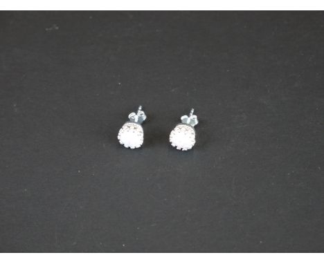 Pair of silver and opal stud earrings 
