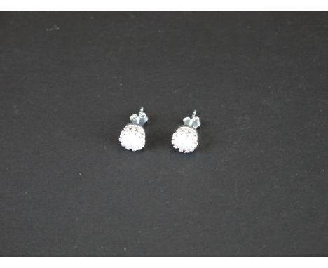 Pair of silver and opal stud earrings 