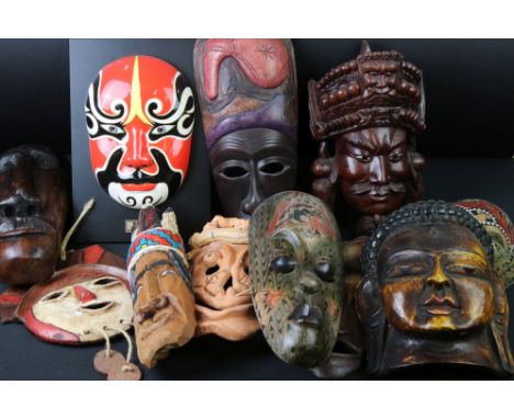 Eleven Face Masks including Wooden, Ceramic and Chinese Liu Zong Min Mask 