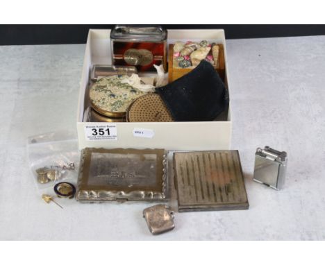 A small group of mixed collectables to include a fully hallmarked silver vesta case, table lighter, 1945 trench lighter, powd