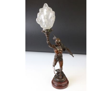 After E. Pirault: A late 19th / early 20th century French spelter table lamp in the form of Victory, the classical figure hol