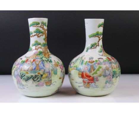 Pair of Chinese Porcelain Famille Verte bottle vases, with enamel decoration depicting figures in traditional dress, shrubber