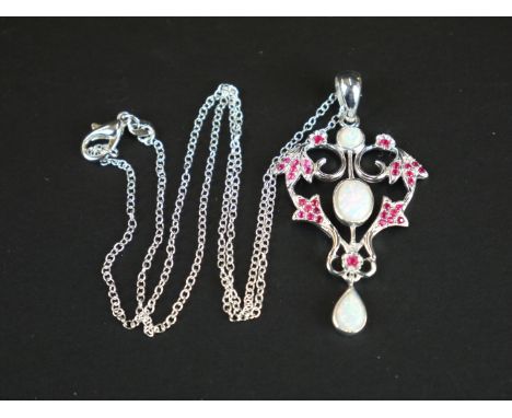 Silver Belle Epoque style pendant necklace set with opal and rubies 