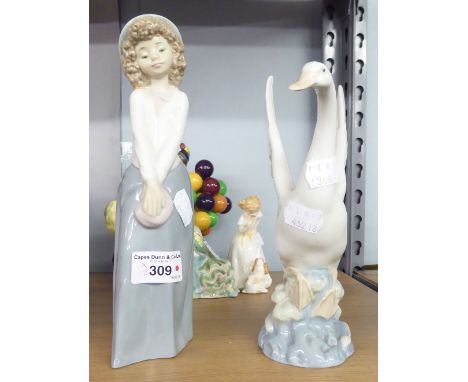 NAO FIGURINES; SWAN AND A YOUNG GIRL (2)