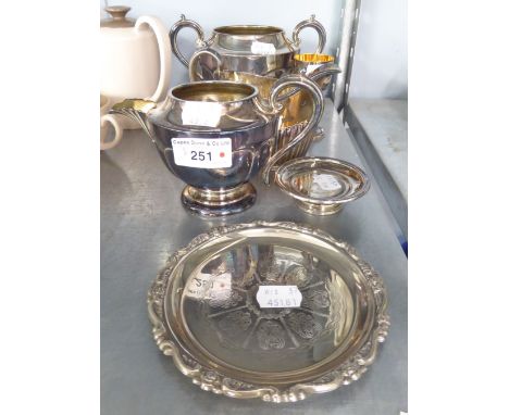 AN ELECTROPLATE SUGAR BASIN AND MILK JUG; A DEMI-LOBED ELECTROPLATE MILK JUG;  A SMALL ELECTROPLATE CARD TRAY AND AN ELECTROP