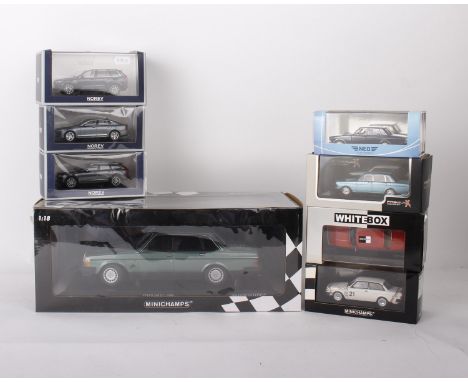 A collection of Volvo model cars in varying scales. To include a 1:18 scale MiniChamps Volvo 240 GL- 1986 (1/702pcs), a 1:43 