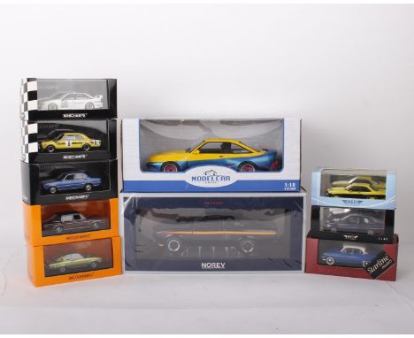 A collection of Opel model cars in varying scales. To include a 1:18 scale Model Car Group Opel Manta B Mattig, a 1:18 scale 