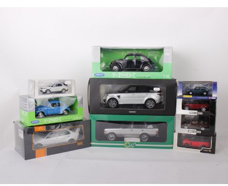 A collection of Land Rover, Range Rover, Mitsubishi and Volkswagen in varying scales. To include a 1:18 scale IXO Models Mits