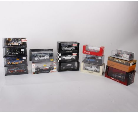  Sixteen 1:43 scale racing model cars from various manufacturers. To include- MiniChamps: Vodafone McLaren Mercedes Showcar (