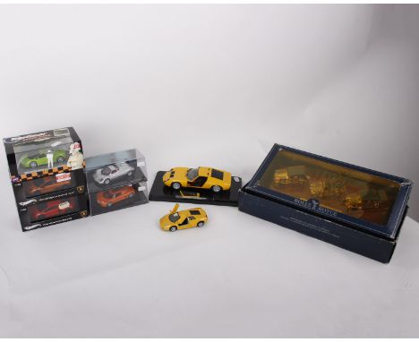 Three Lamborghini in 1:43 scale with a single 1:40 and a 1:24 scale and The Rolls Royce Collection containing three 24K Rolls