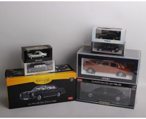 A collection of seven Mercedes Benz model cars of varying scale and manufacturer. To include a 1:18 scale The Premium Collect