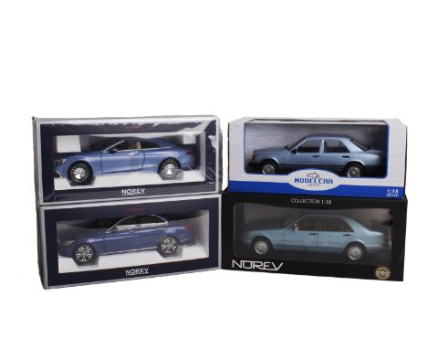 A collection of four boxed Mercedes-Benz of 1:18 scale. To include a Norev Mercedes-Benz S 500, a Norev Mercedes 450 SEL- 197