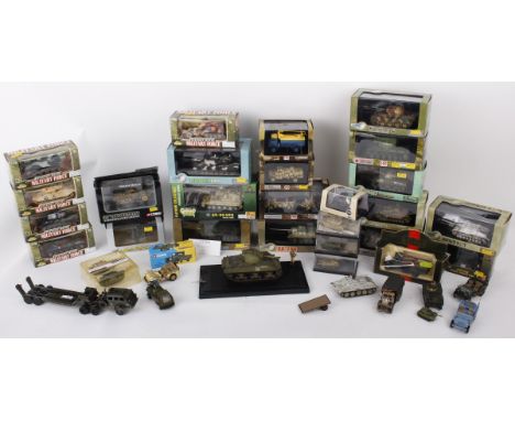 Approximately thirty-four military related model vehicles in various scales and multiple manufacturers. Dragon Armour: 1:72 s