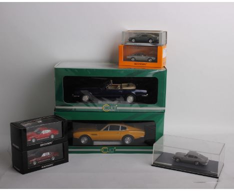 A collection of Aston Martin model cars in varying scales. To include a 1:18 scale Cult Scale Models Aston Martin V8 Volante 