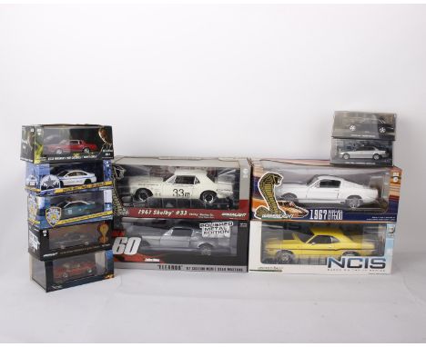 A collection of Greenlight Hollywood model cars in various scales and three 1:43 scale James Bond model cars. To include 1:18