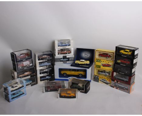 A collection of twenty-five 1:43 scale Ford models cars of varying manufacturers and a Model Car Group 1:18 scale Die-cast Fo