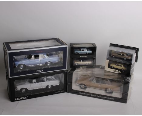 A collection of seven Mercedes varying in scale and model manufacturer. To include a 1:18 scale Norev Mercedes-Benz 280 SE Ca