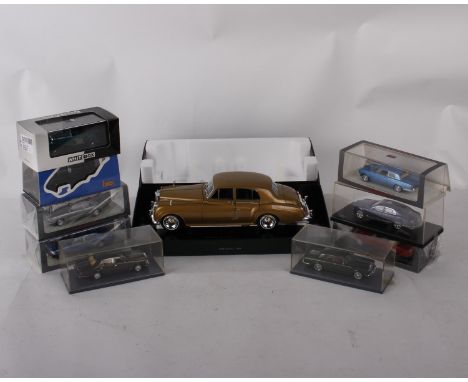 A collection of 1:43 scale Bentley model cars and a 1:18 scale MiniChamps Bentley S2 in gold, 1960. To include a Kyosho Bentl