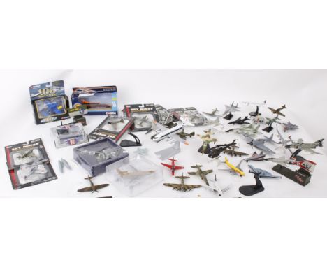  A large collection of boxed and unboxed military aircrafts to include several Die-cast Motor Max Sky Wings, Corgi Bloodhound