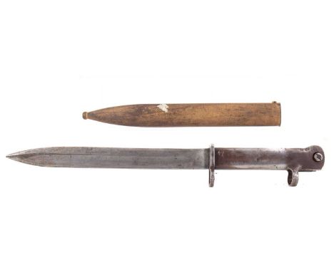 GERMAN IMPERIAL ERSATZ BAYONET WWI PERIOD with fullered steel blade, the grip numbered 22923, in scabbardthe bayonet 38.5cm l