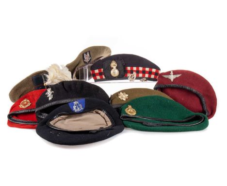 COLLECTION OF MILITARY CAPS AND BADGES QEII including the Highland Light Infantry Glengarry with badge and nine further beret